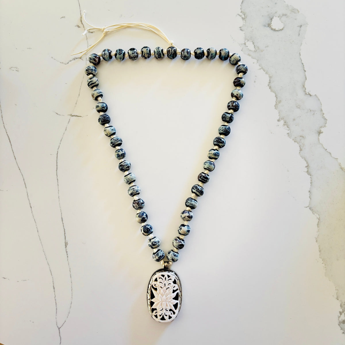 Talisman Necklace - Lotus Flower necklace alternate angle view 5, detailed close-up