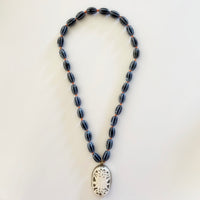 Talisman Necklace - Blue Lotus necklace alternate angle view 4, detailed close-up