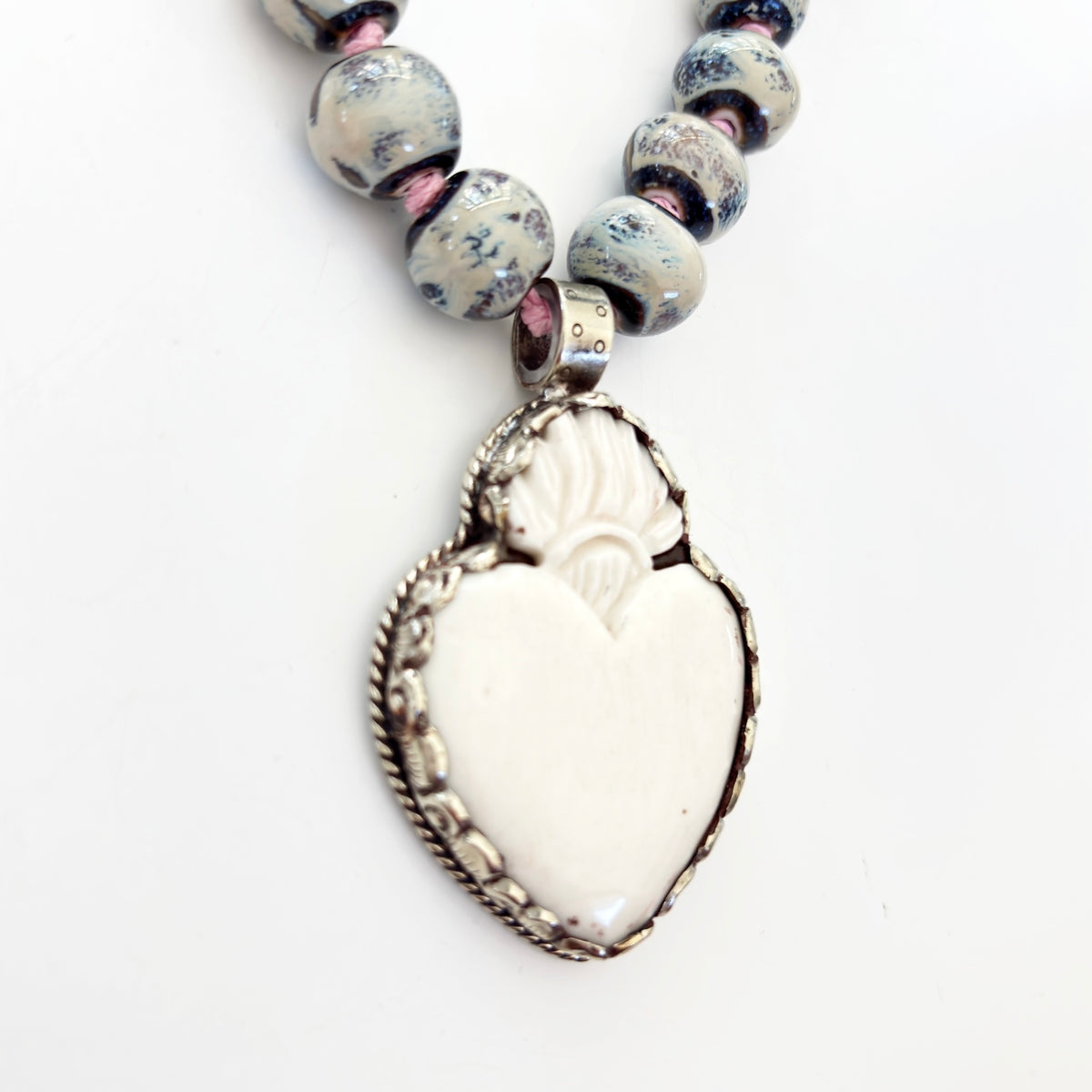 Talisman Necklace - Celestial Sacred Heart necklace alternate angle view 2, detailed close-up