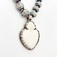 Talisman Necklace - Celestial Sacred Heart necklace alternate angle view 2, detailed close-up