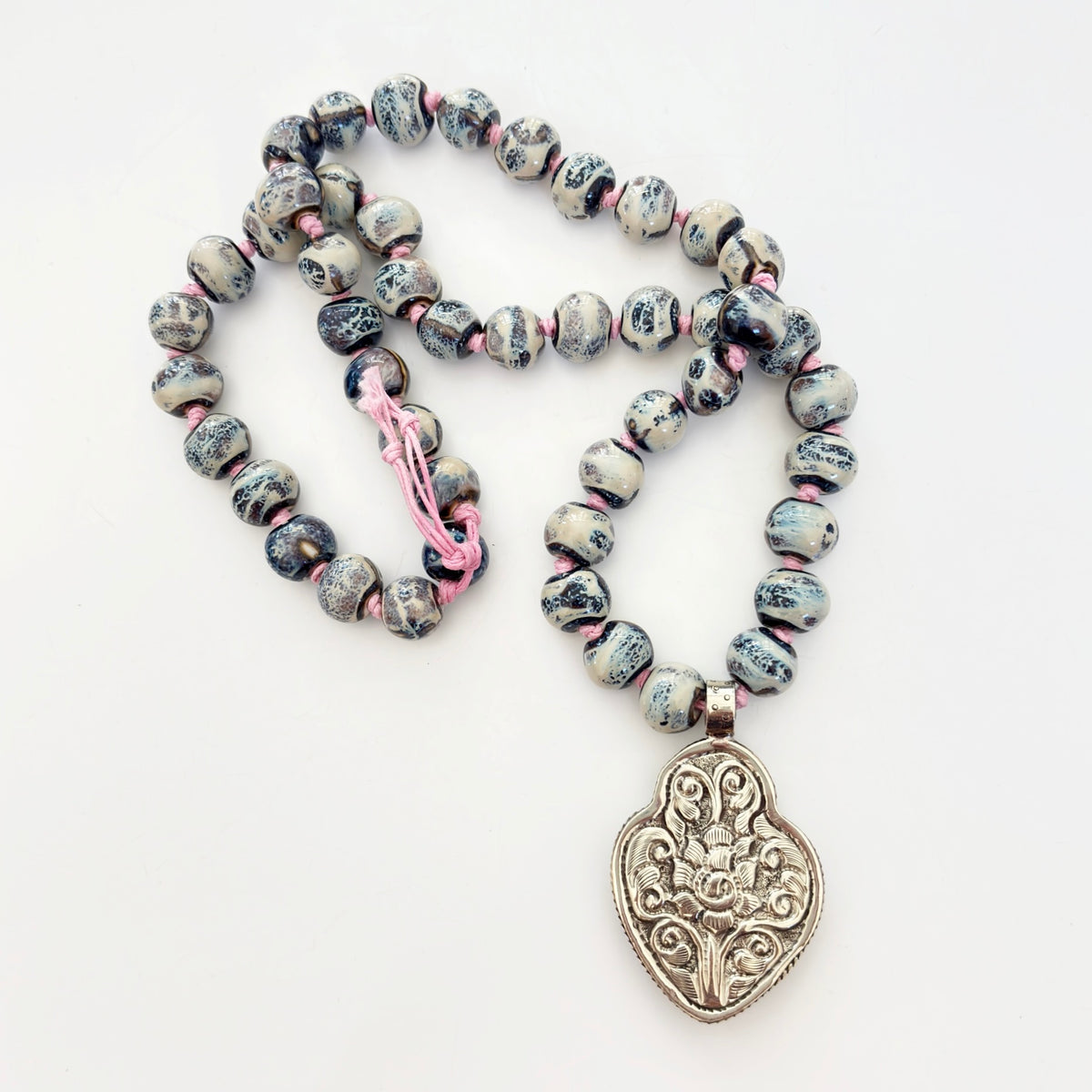 Talisman Necklace - Celestial Sacred Heart necklace alternate angle view 3, detailed close-up