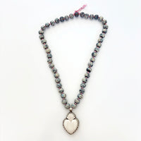Talisman Necklace - Celestial Sacred Heart necklace alternate angle view 4, detailed close-up