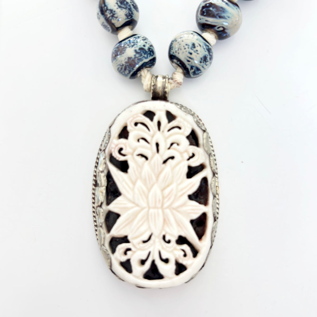 Talisman Necklace - Lotus Flower necklace alternate angle view 1, detailed close-up