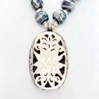 Talisman Necklace - Lotus Flower necklace alternate angle view 1, detailed close-up