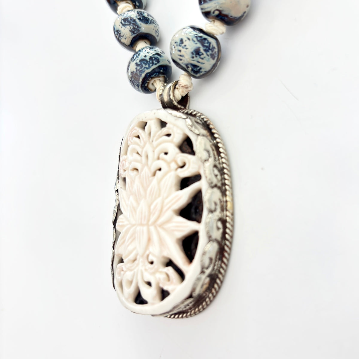 Talisman Necklace - Lotus Flower necklace alternate angle view 2, detailed close-up