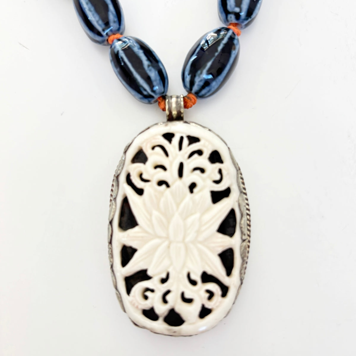 Talisman Necklace - Blue Lotus necklace alternate angle view 1, detailed close-up