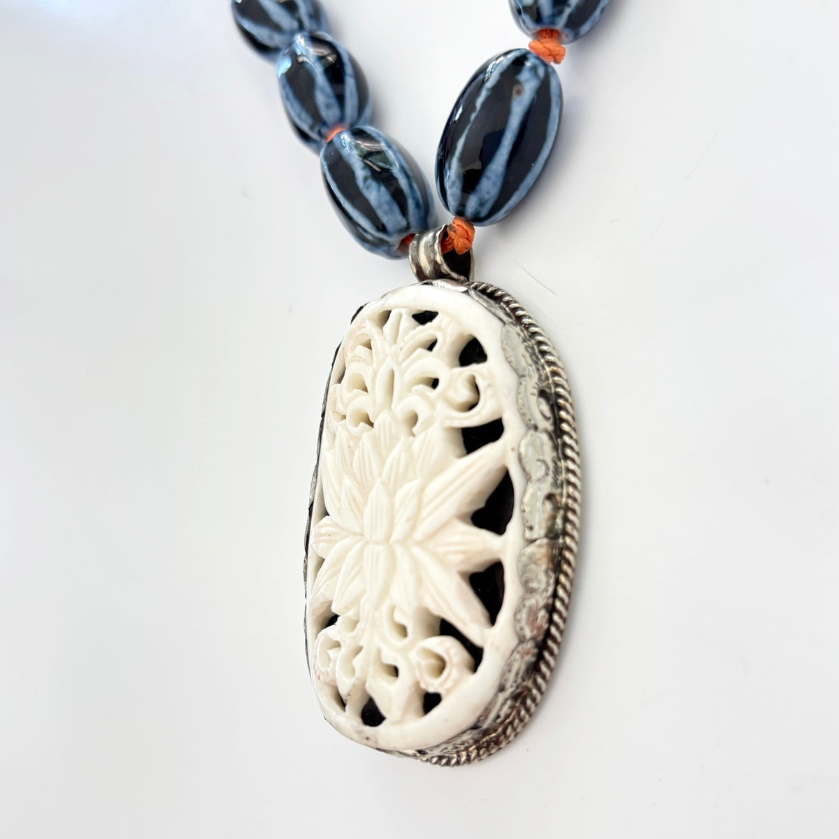 Talisman Necklace - Blue Lotus necklace alternate angle view 2, detailed close-up