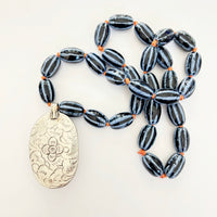 Talisman Necklace - Blue Lotus necklace alternate angle view 3, detailed close-up